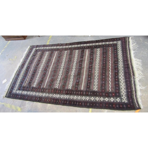 1881 - ORIENTAL KELIM RUG OF DARK GROUND 157 x 302 cms