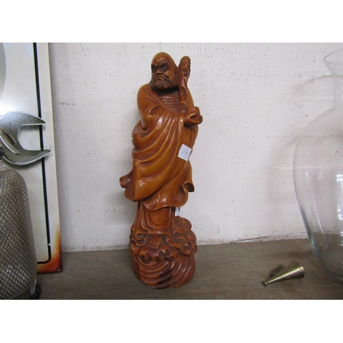 19 - CARVED CHINESE WOODEN FIGURE