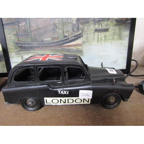 23 - MODEL OF A LONDON TAXI