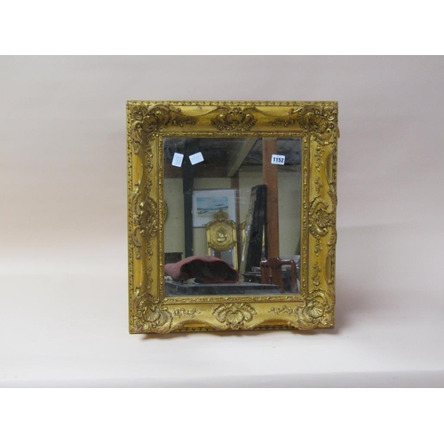 1152 - GILT FRAMED WALL MIRROR, 58CM X 52CM