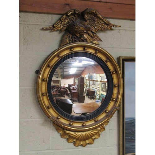 1162 - LATE GEORGIAN STYLE BEADED GILT WOOD CIRCULAR WALL MIRROR WITH EAGLE MOUNT, 102CM X 64CM OVERALL