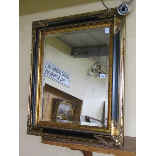 1169 - GILT WOOD AND EBONISED BEVEL EDGE WALL MIRROR