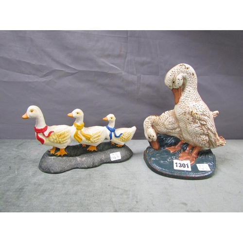 1301 - TWO PAINTED IRON DOOR STOPS - GEESE AND DUCKS