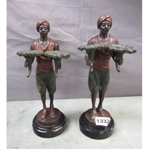 1333 - PAIR OF PAINTED METAL STANDING FIGURE CANDLE HOLDERS ON CIRCULAR BASES, 23CM H