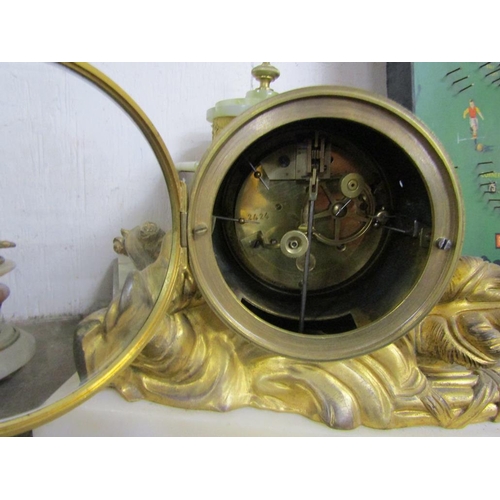 10 - TWO FRENCH GILT METAL AND ALABASTER BASED MANTEL CLOCKS; ONE CASE