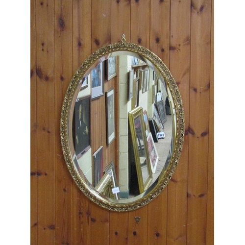 1321 - MOULDED GILT FRAMED OVAL WALL MIRROR, 77CM X 56CM