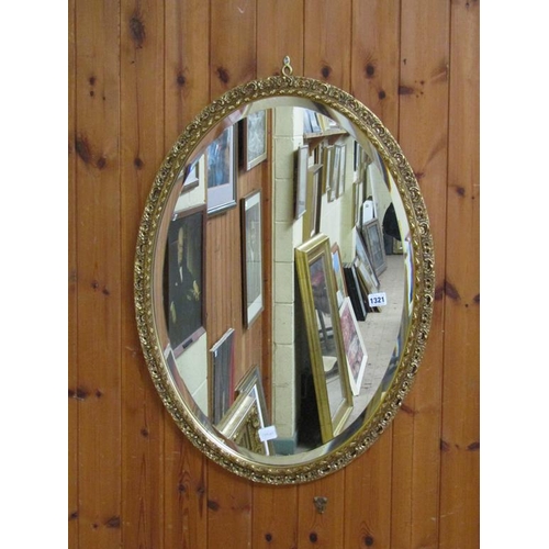 1321 - MOULDED GILT FRAMED OVAL WALL MIRROR, 77CM X 56CM