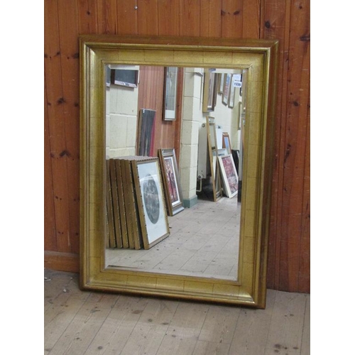 1335 - MOULDED GILT FRAMED WALL MIRROR, 117CM X 85CM