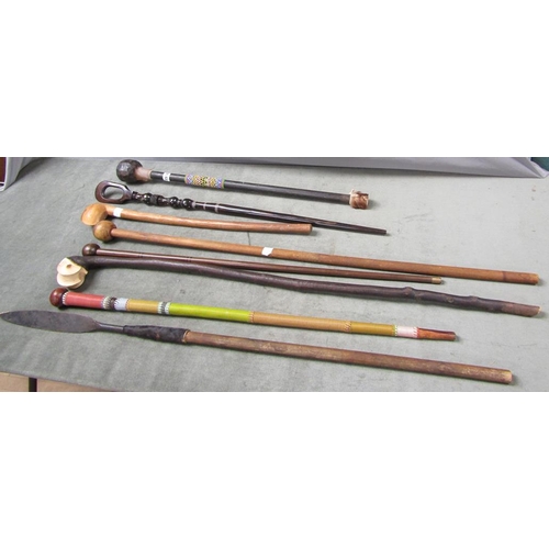 1554 - EIGHT MIXED AFRICAN AND OTHER WALKING STICKS, CLUBS AND A SPEAR