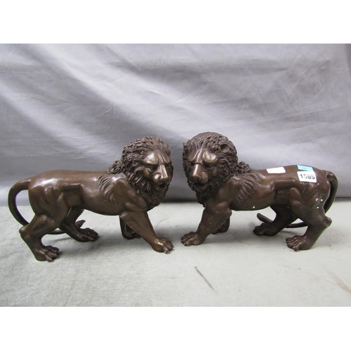 1569 - PAIR OF BRONZED LION FIGURES, EACH 32cms L