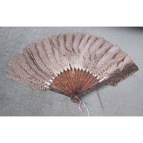 1578 - ORIENTAL FEATHER FAN WITH ORIENTAL CARVED TORTOISESHELL STICKS - 20cms W