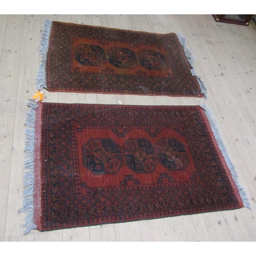 2096 - ORIENTAL RED GROUND WOOLLEN RUG 83CM X 139CM; DARK ORANGE AND BLUE GROUND RUG, 84CM X 140CM