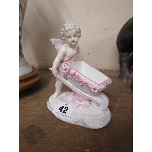 42 - SITZENDORF PORCELAIN FIGURE GROUP - CHERUB WITH WHEELBARROW