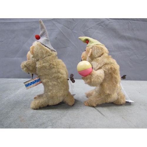 1335 - TWO CLOCKWORK MUSICAL MONKEYS, EACH APPX 22cms H