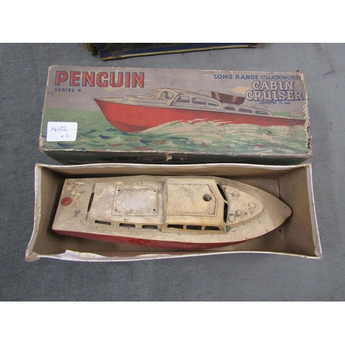 1337 - ELECTRIC AUSTIN SOMERSET MODEL CAR TOGETHER WITH A PENGUIN SERIES 4 CLOCKWORK CABIN CRUISER, BOTH IN... 