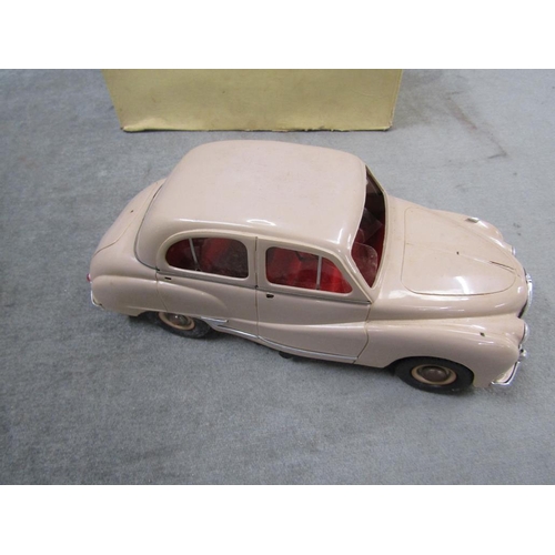 1337 - ELECTRIC AUSTIN SOMERSET MODEL CAR TOGETHER WITH A PENGUIN SERIES 4 CLOCKWORK CABIN CRUISER, BOTH IN... 