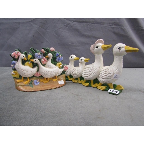 1342 - TWO PAINTED METAL DUCK DOOR STOPS - 29 & 20cms