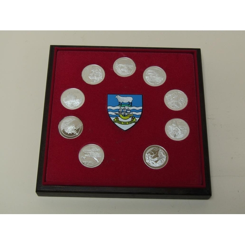 1520 - BOXED SET OF NINE SILVER FALKLAND ISLANDS MEDALLIONS