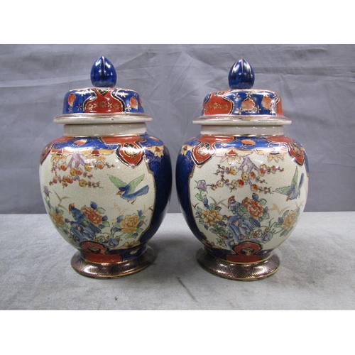 1854 - PAIR OF ORIENTAL JARS AND COVERS, 32CM H