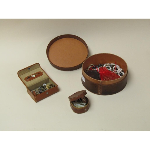 1671 - BROWN LEATHER COLLAR BOX CONTAINING COSTUME JEWELLERY