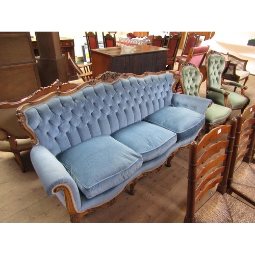 1928 - CARVED SHOW FRAMED AND BUTTONED UPHOLSTERED THREE SEATER SETTEE