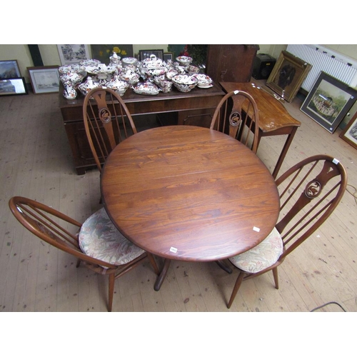 1932 - ERCOL PEDESTAL DINING TABLE AND FOUR HOOPED SPINDLE BACK DINING CHAIRS WITH SWAN CRESTS