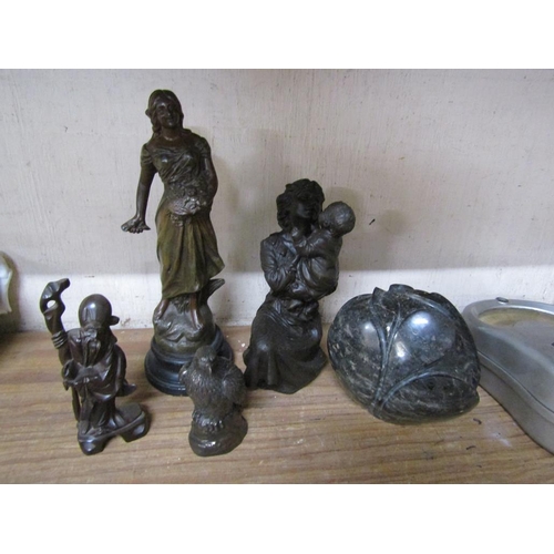 86 - BRONZE AND SPELTER FIGURES AND A STONE SCULPTURE