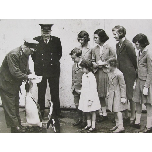 10 - A collection of thirty five black and white press release photographs, stamped and with typed descri... 