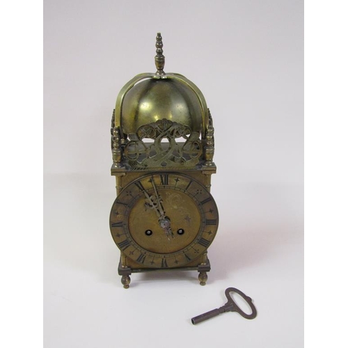 17 - A late 19c lantern clock with French Japy Freres movement.  The brass case is of traditional form wi... 