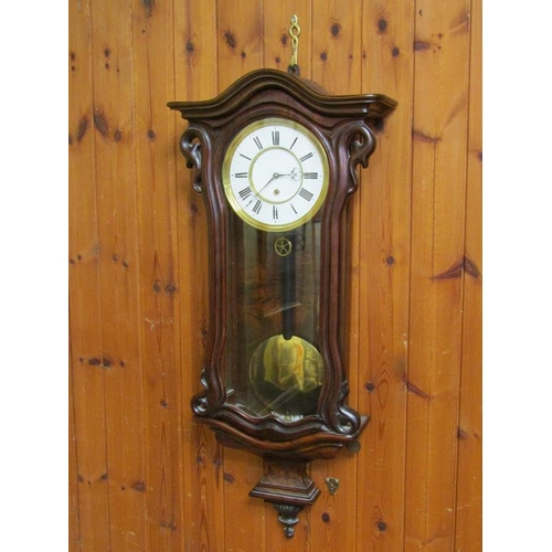 23 - A late 19c Austrian single weight Vienna regulator in a small serpentine walnut case.  The movement ... 