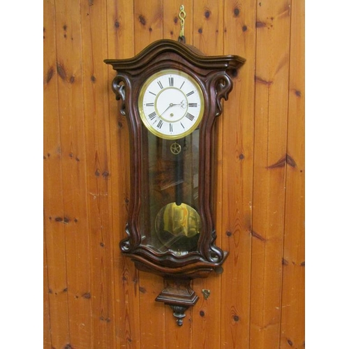 23 - A late 19c Austrian single weight Vienna regulator in a small serpentine walnut case.  The movement ... 