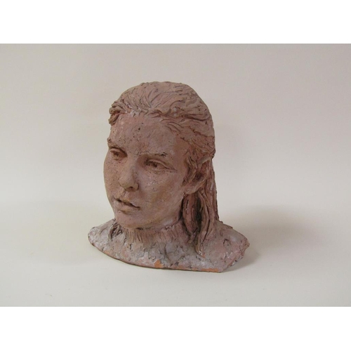 52 - A terracotta bust of a young girl, by Karin Jonzen, 29cm h.
