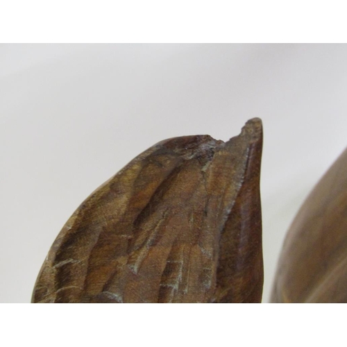 55 - A carved trunk wood rhinoceros, 113cm l, 48cm h.