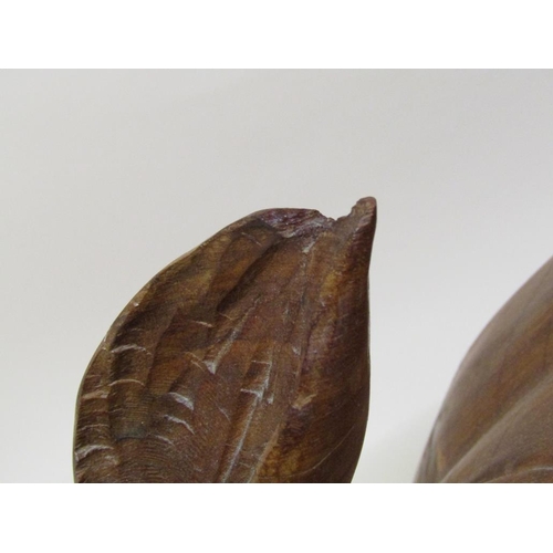 55 - A carved trunk wood rhinoceros, 113cm l, 48cm h.