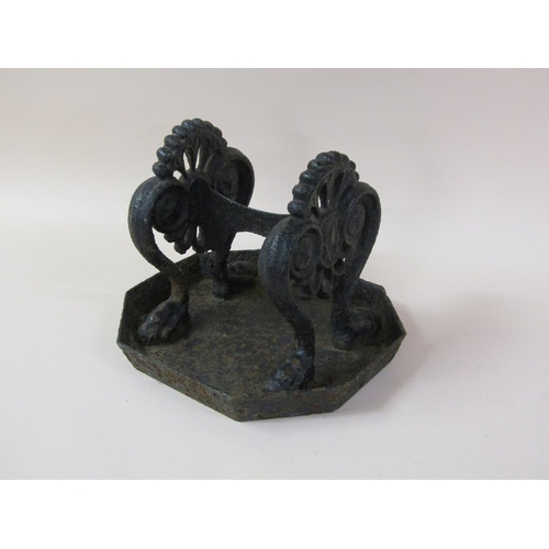 12 - A Victorian cast iron boot scraper, 35cm w.