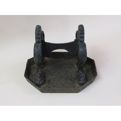 12 - A Victorian cast iron boot scraper, 35cm w.