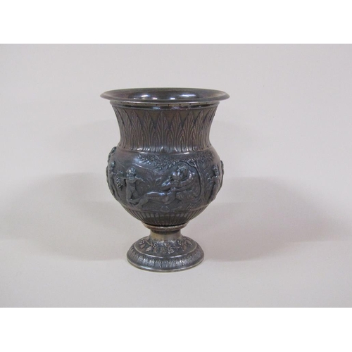 122 - A 19c Continental silver vase decorated with leaf and a band of mythical scenes, 12.7ozt, 13.5cm h.