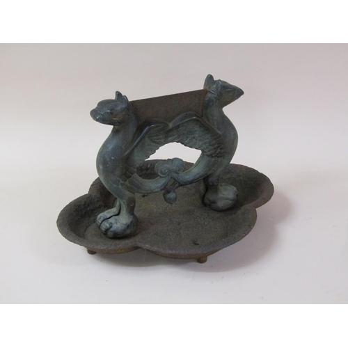 13 - A 19c bronze and cast iron boot scraper, the scraper formed as two griffin, 38cm w.