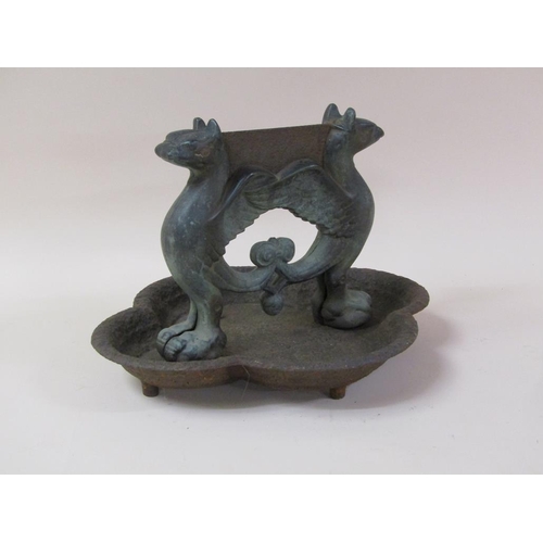 13 - A 19c bronze and cast iron boot scraper, the scraper formed as two griffin, 38cm w.