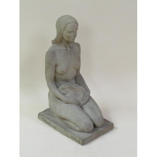 14 - A composite stone figure of a kneeling naked lady holding a rabbit, marked A. Blackman 1936. 68cm h.