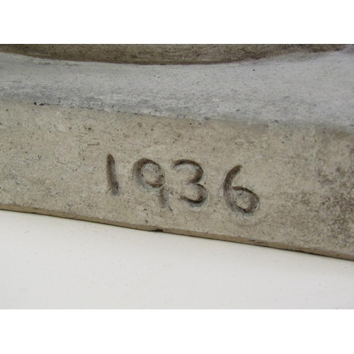 14 - A composite stone figure of a kneeling naked lady holding a rabbit, marked A. Blackman 1936. 68cm h.