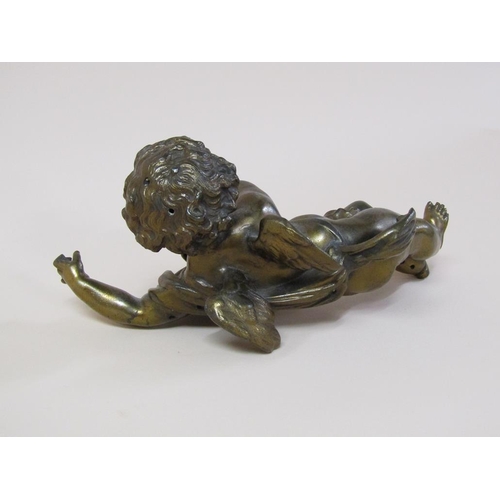 31 - A gilt metal figure of a cherub, 28cm l.