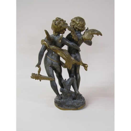 32 - A late 19c gilt metal and silvered French figure group of a cherub with an angel, a/f, 38cm h.