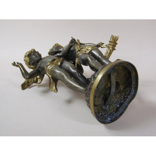 32 - A late 19c gilt metal and silvered French figure group of a cherub with an angel, a/f, 38cm h.