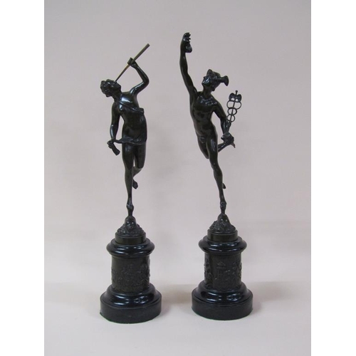 37 - A pair of patinated bronze figures on turned marble bases, both with embossed collars depicting Bacc... 