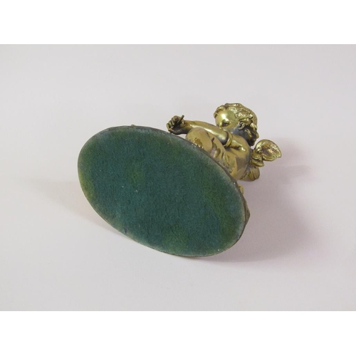 41 - A late 19c gilt metal figure group of a Blacksmith cherub, 16cm h.