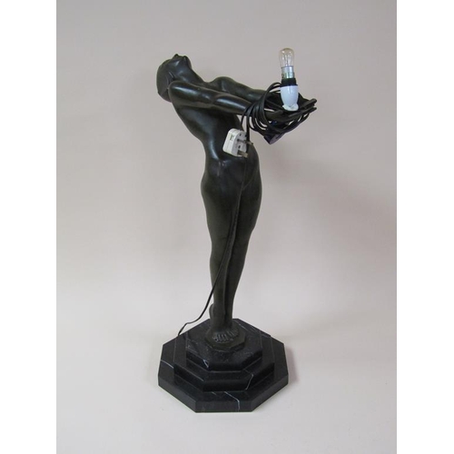 44 - A 1920/30's bronze standing electrolier in the form of a naked female on a stepped marble base, the ... 