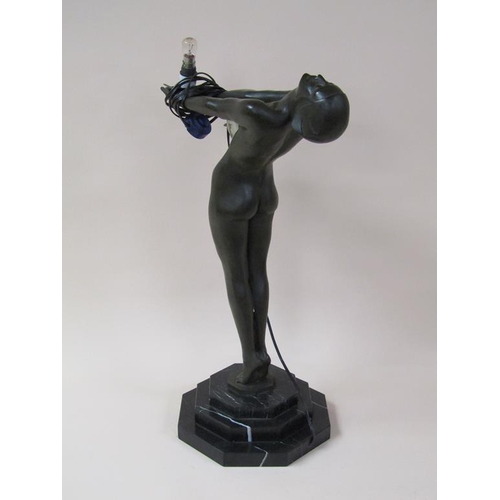44 - A 1920/30's bronze standing electrolier in the form of a naked female on a stepped marble base, the ... 