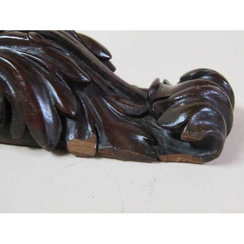 58 - A pair of 19c mahogany wall brackets, the platform with carved edge supported on carved scroll and l... 