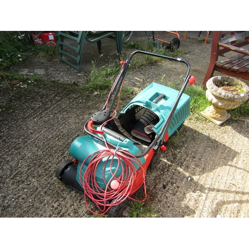 956 - MOWER AND SOME WELLIES